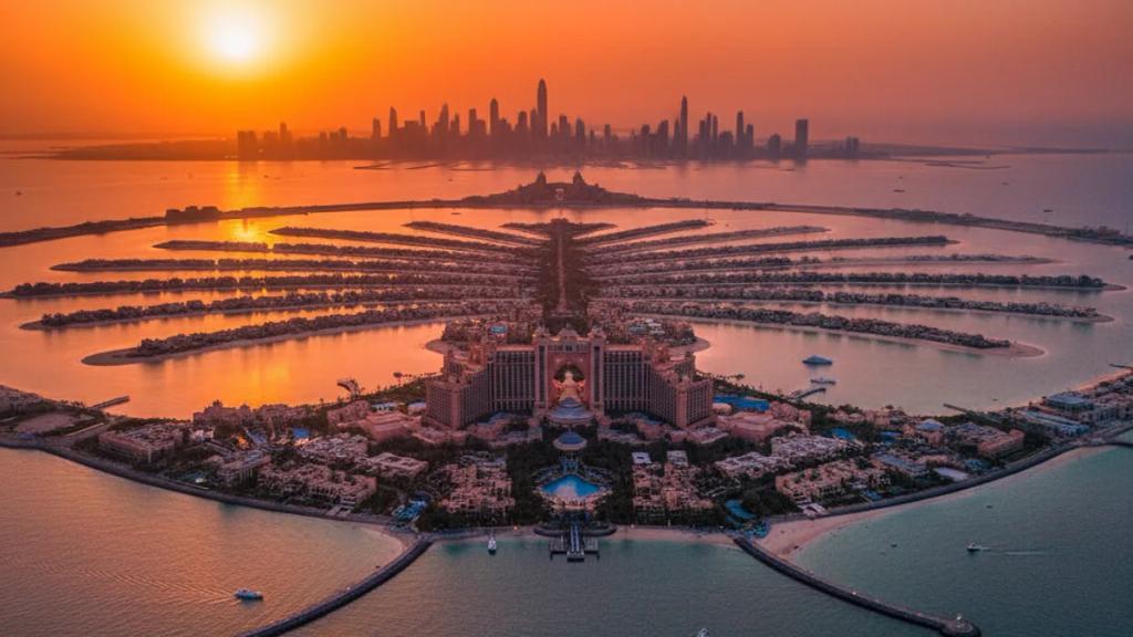 UK traveler on a Dubai rooftop at dusk checking a phone showing a connected mobile signal